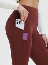 25" maroon fleece-lined yoga leggings with pockets for phone and valuables. #color_Wine Red