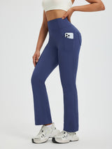 Women's navy boot-cut fleece running pants with phone pocket. #color_Navy Blue