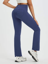 Blue fleece boot-cut women's running pants with high waist and sculpted hip seams. #color_Navy Blue