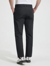 Back view of Baleaf black UPF 50+ golf pants, 30'' inseam, 5 pockets, lightweight stretch. #color_Black