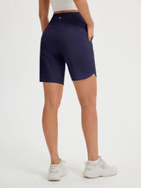 Baleaf women's navy 9" UPF 50+ high-rise split leg shorts with pockets. #color_Navy