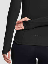 Black compression long-sleeve running top with thumbholes and reflective detail. #color_Black