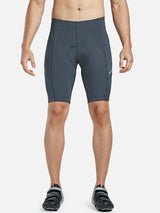 Men's UPF 50+ dark grey cycling shorts with moisture-wicking fabric and side pockets. #color_Gray