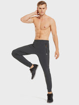 Men's dark grey lightweight jogger running pants with zipper pocket and tapered cuffs. #color_Dark Gray