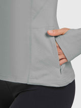 Grey fleece crew pullover with secure zip pocket and thumbhole cuff. #color_Light Gray