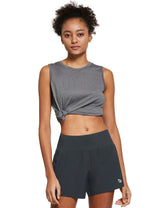 Model in charcoal women's 5" quick-dry running shorts and grey knotted athletic tank top. #color_Dark Gray