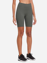 Women's 8-inch high-waisted compression biker shorts in grey with side pockets for yoga and fitness. #color_Dark Gray