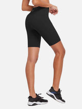 Women's black 8-inch high-waisted compression biker shorts with side pockets. #color_Black