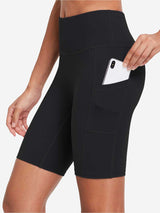 Black women's 8" high-waisted compression biker shorts with phone in side pocket. #color_Black