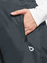 Dark grey outdoor ski bib pants with waterproof fabric, zippered pocket, and leaf logo. #color_Dark Gray