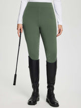 Women's full seat silicone breeches in olive green, with textured pattern and black boots. #color_Army Green