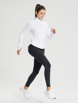 Women's black fleece-lined cycling leggings with zippered pocket and white athletic jacket. #color_Black