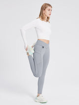 Grey fleece-lined multi-pocket hiking leggings with V-shaped waistband. #color_Gray