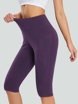 Plus size women's dark purple knee-length capris with pockets & high elastic waist. #color_Dark Purple