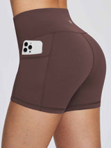 Women's brown 3" high-waisted compression biker shorts with phone pocket and tummy control waistband. #color_Dark Brown