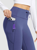 Purple high-waist fleece-lined flare pants with drawstring and phone pocket
