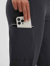 Women's dark grey cycling capris with zippered phone pocket & reflective stripe #color_Black