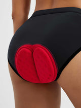 Women's black cycling underwear featuring a supportive red 4D padded seat cushion for enhanced comfort. #color_Black
