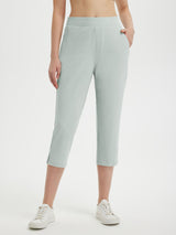Women's 20" high-waisted light green golf capri pants with zip pockets #color_Light Gray