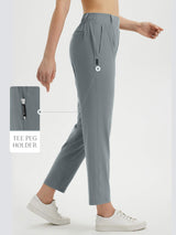 Women's grey 27" golf pants with visible tee peg holder feature. #color_Dark Gray