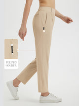 Women's beige 27" golf pants with integrated tee holder and golf tee shown. #color_Khaki