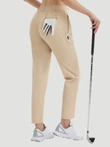 Women's beige 27" golf pants with elastic waist, belt loops, and golf glove in pocket. #color_Khaki