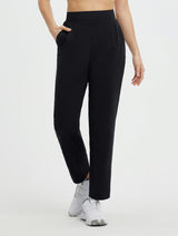 Golf Pleated Fleece Slim-Fit Pants in black, showing front pleats and pockets #color_Black