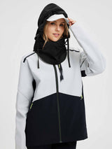 Unisex waterproof fleece ski hat in black, worn with a grey and black ski jacket. #color_Black