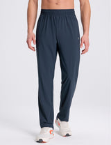 Men's athletic dark navy tapered joggers with stretch waistband. #color_Navy Blue