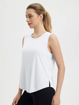 Women's Sleeveless Racerback Running Tank in white, featuring scoop neck and curved hem #color_White