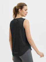 Women's black racerback running tank, curved hem, reflective details. #color_Black