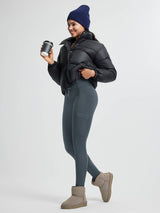 High-waisted fleece running leggings with pockets, black puffer jacket and beanie. #color_Charcoal Gray