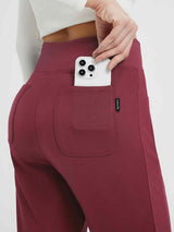 Burgundy fleece running tapered pants with back pocket detail and phone. #Color_Wine Red