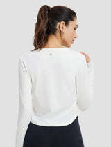 Women's white long-sleeve running t-shirt with crew neck and side ruched detail. #Color_Star White