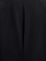 Black raglan fleece running top back slit detail with stitched seams. #color_Black