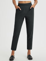 Black high-rise tapered trousers with cuffed hem for casual sun protection. #color_Anthracite
