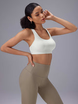 White low-impact sports bra and taupe high-rise yoga shorts for Everyday Yoga Comfort Set. #color_White