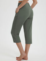 Women's olive green 19" quick-dry yoga capri pants with zipper pockets and adjustable drawstring waistband. #color_Army Green