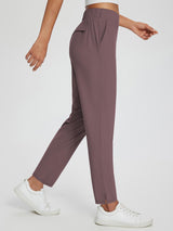 Mauve Sculpt high-waist tapered yoga pants with elastic waistband, split hem, and pockets. #color_Dark Brown