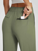 Sculpt High-Waist yoga pants in olive green with zippered pocket. #color_Army Green