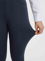 Women's navy blue business pants fabric showing stretch. Polyester spandex blend. #color_Navy Blue