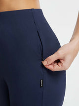 Navy blue Yoga Commuter high-waisted wide-leg pants with zippered pocket detail. #Color_Navy Blue