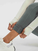 Grey fleece yoga leggings petite fit ankle cuff detail with white sneaker. #color_Heather Dark Gray