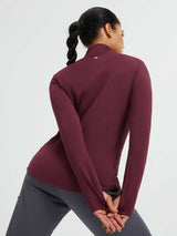 Back view of women's burgundy long-sleeve yoga top with thumbholes #color_Wine Red