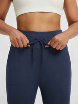 Women's navy high-waisted yoga leggings with drawstring and pockets. #color_Navy Blue