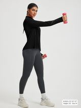 Baleaf UPF 50+ black half zip cycling jersey on active woman #color_Black