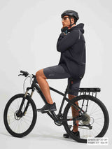 Baleaf men's grey 4D padded bike shorts with 10" inseam, worn by cyclist. #color_Dark Gray