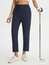 Baleaf navy women's stretchy wrinkle-free 25'' golf pants with golf club. #color_Navy
