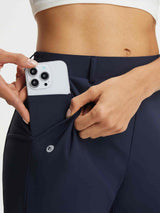 Navy Baleaf 25'' stretchy golf pants with smartphone in deep side pocket. #color_Navy