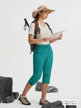 Baleaf women's teal 19" cargo capri pants, lightweight with 7 pockets. #color_Teal Green